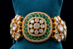 Round Shaped bracelet with green stone work by Khaitan Jewels