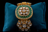 Round Shaped bracelet with green stone work by Khaitan Jewels
