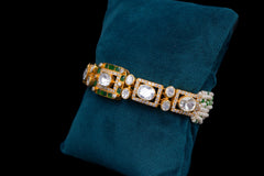 Silver Green Polki Bracelet Embellished with Emeralds and Diamonds by Khaitan Jewels