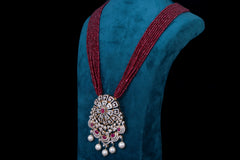 Polki Diamond Pendant Necklace Adorned with Red Beads by Khaitan Jewels