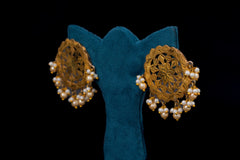 Golden round shaped earring by Khaitan Jewels